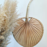 Braided palm leaf fan shape