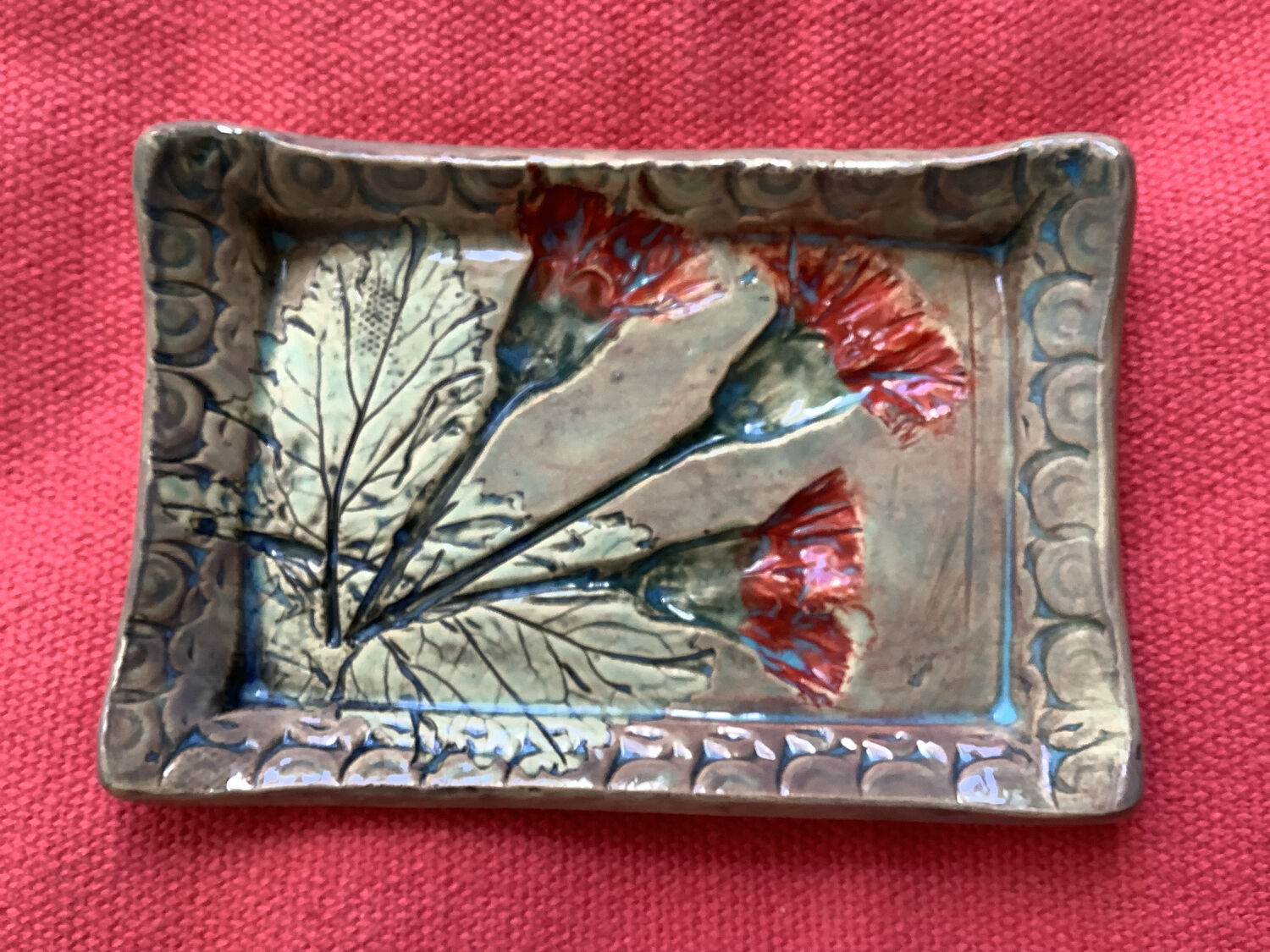 Arty enameled terracotta dish signed by the artist