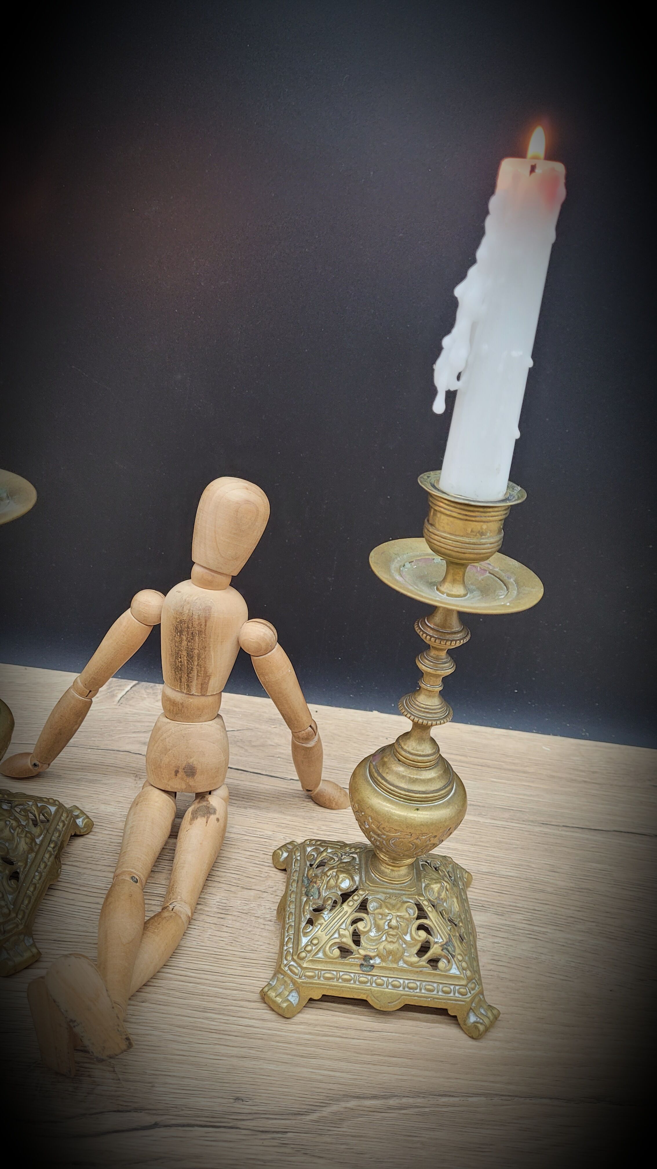 Duo worked brass candle holders