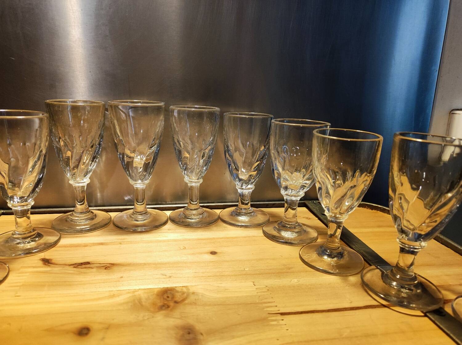 12 small twisted bistro glasses, 19th century
