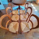 6 mulched solid wood chairs and 2 canework chairs