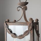 Wrought iron lantern with glass panels, leaf motifs