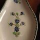 Two iron clay bowls decorated with cornflowers.