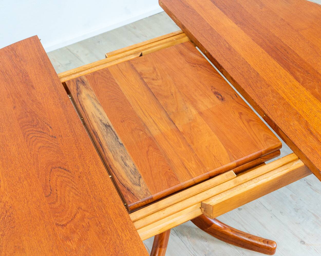 1970s solid teak dining table with Scandinavian design.