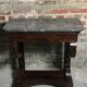 Console era restoration in mahogany veneer with St. Anne marble top.