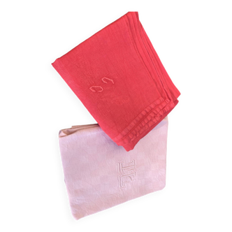 Duo set, consisting of two large pink-dyed cotton and linen towels, embroidered, TK monograms