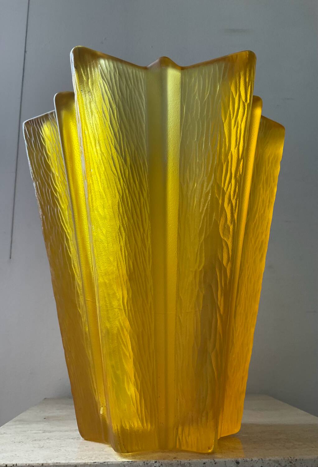 Art Deco star vase in yellow glass from the 1950s