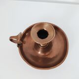 Set of a pair of candle holders and a hand candle holder