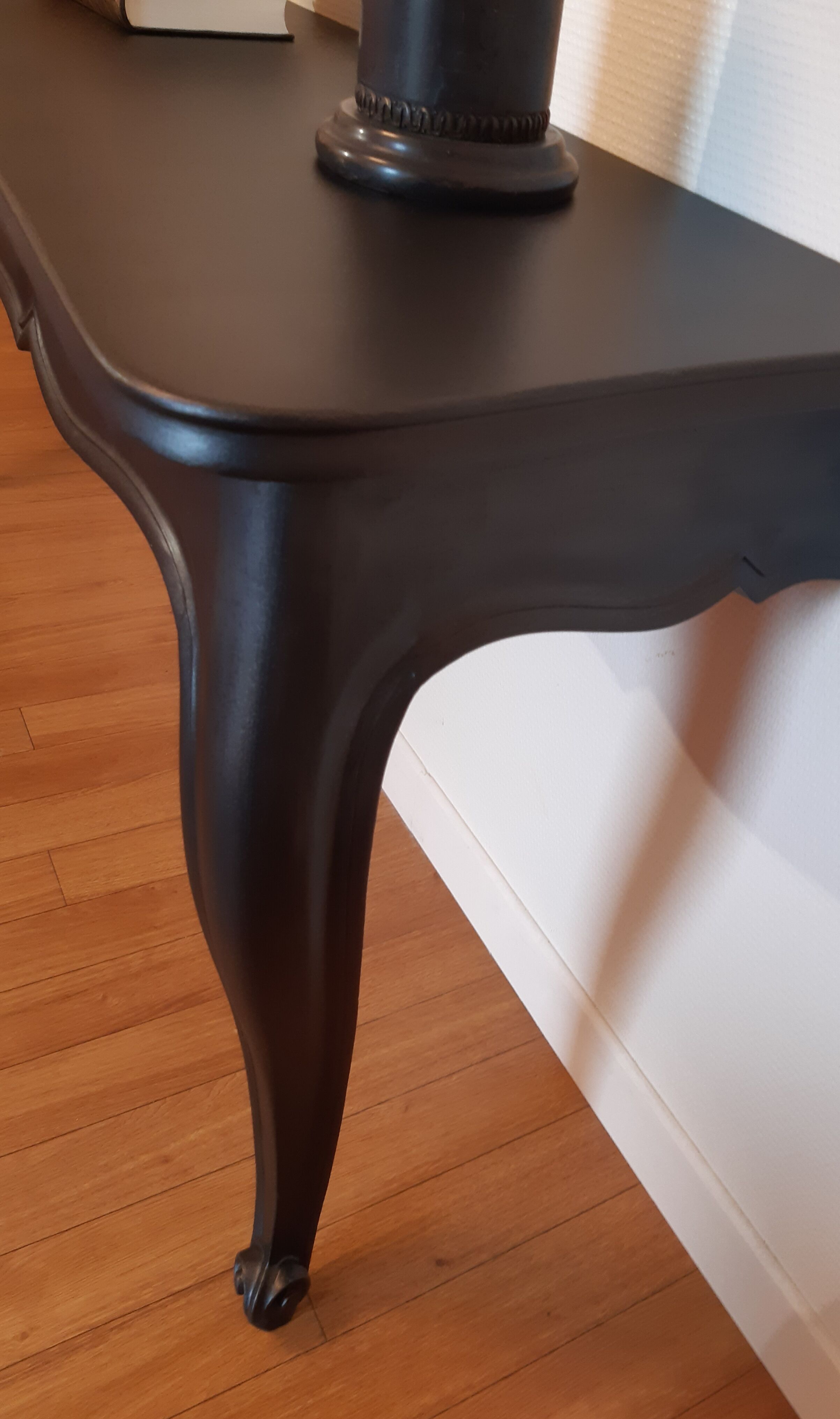 Louis XV-style black wall console