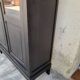 Parisian showcase in black patinated oak