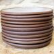 11 enameled stoneware dessert plates by Jeanne et Norbert Pierlot Ratilly