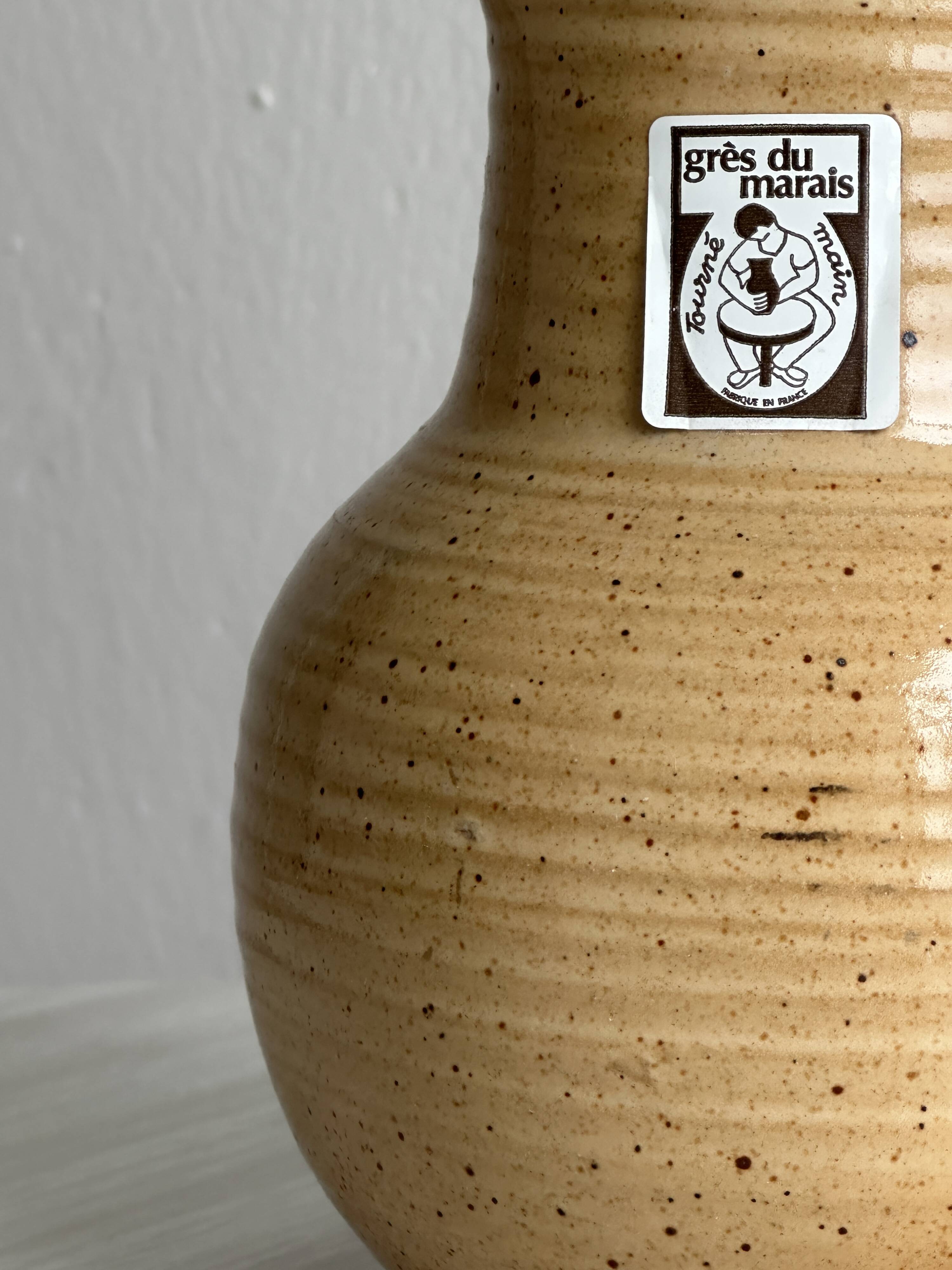 Hand-thrown ceramic pitcher