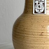 Hand-thrown ceramic pitcher