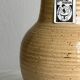 Hand-thrown ceramic pitcher