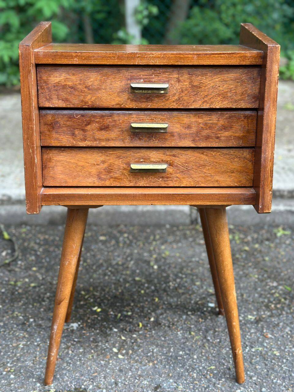 Scandinavian bedside table in oak from the 1960s with tapered legs and 3 drawers.