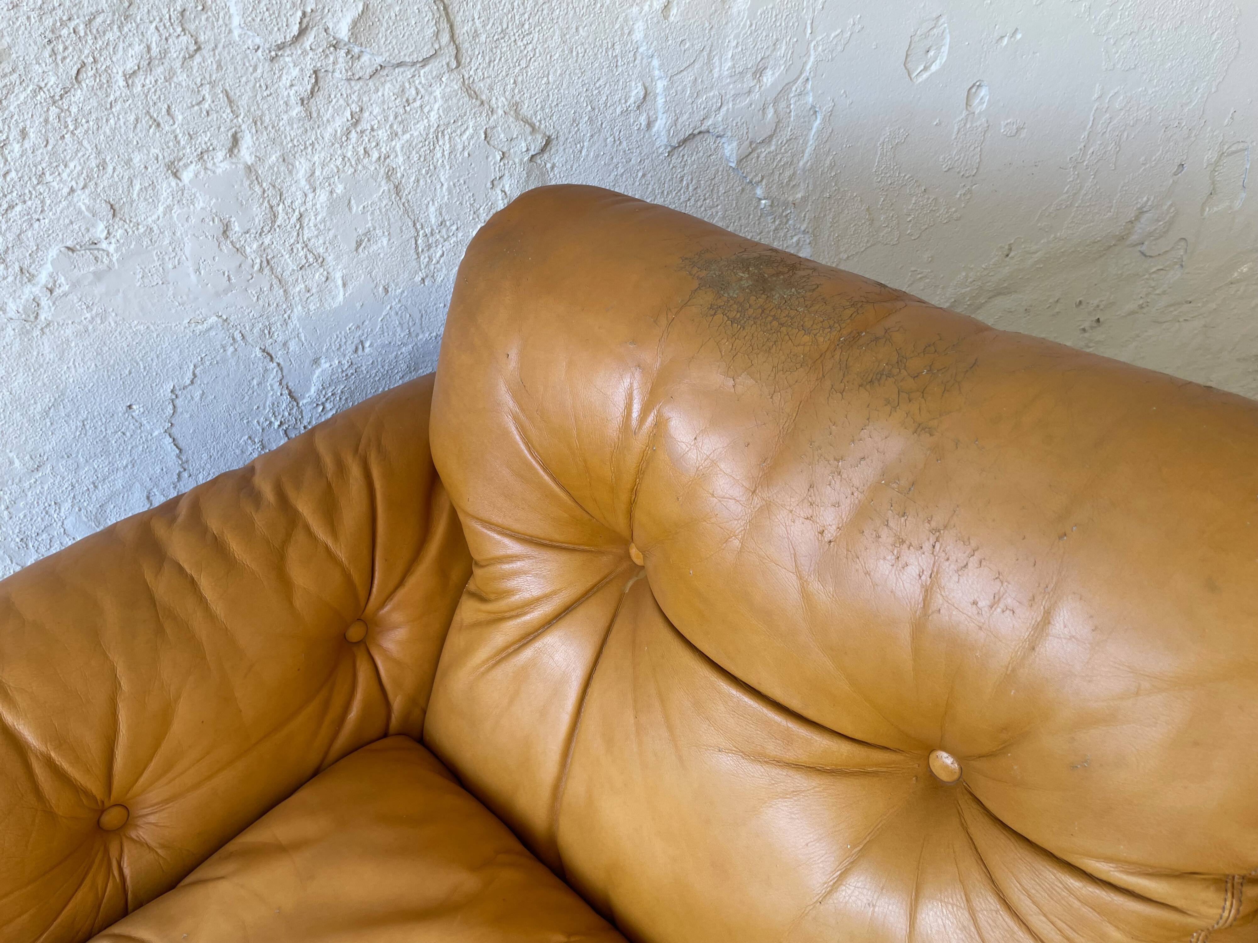 Two seats leather sofa, by Tobias Scarpa