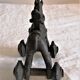 Old child's toy. Horse with bronze wheels. Ethnic object.