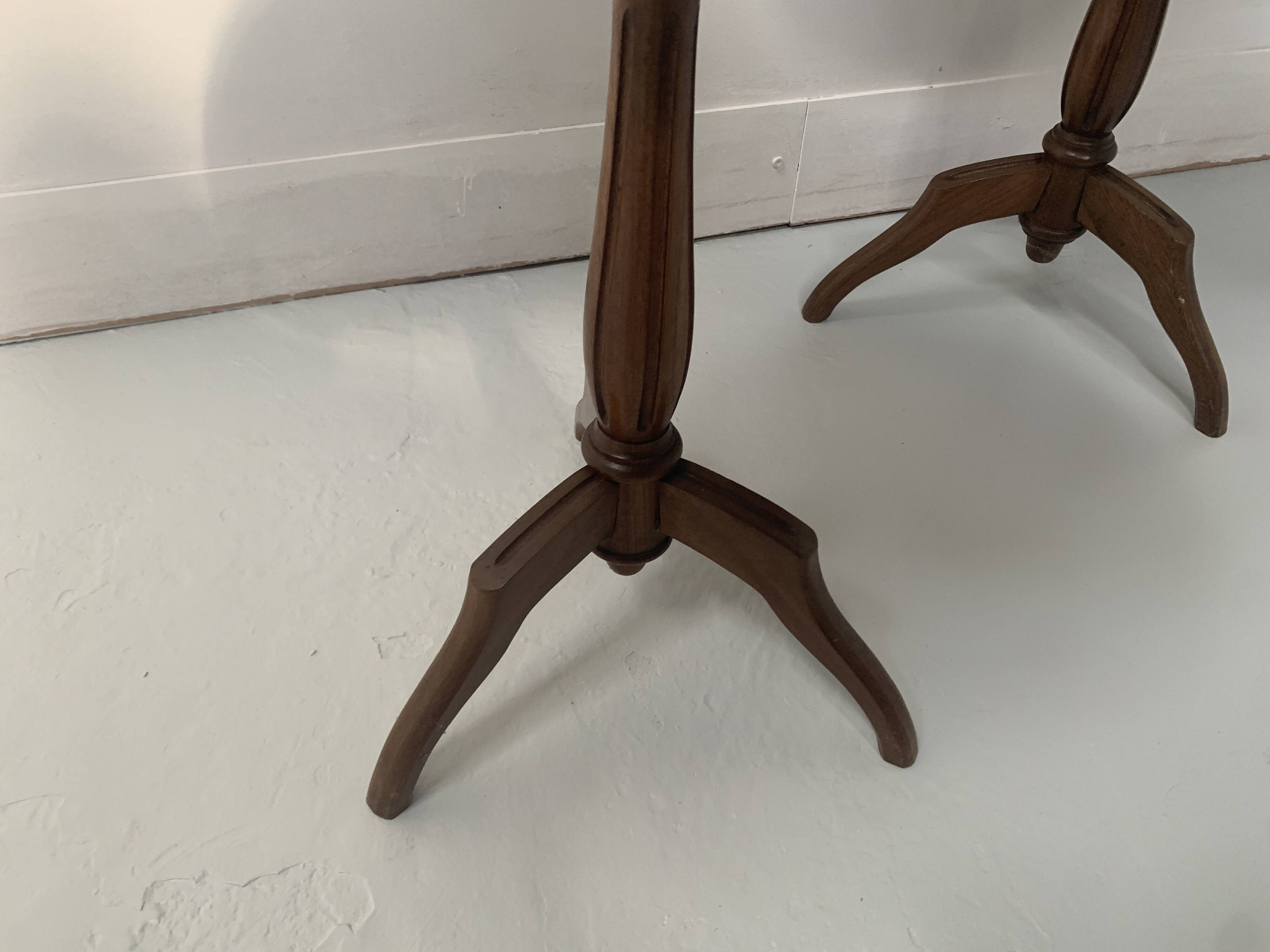 Pair of Louis XVI style pedestal tables in stained beech, 20th century