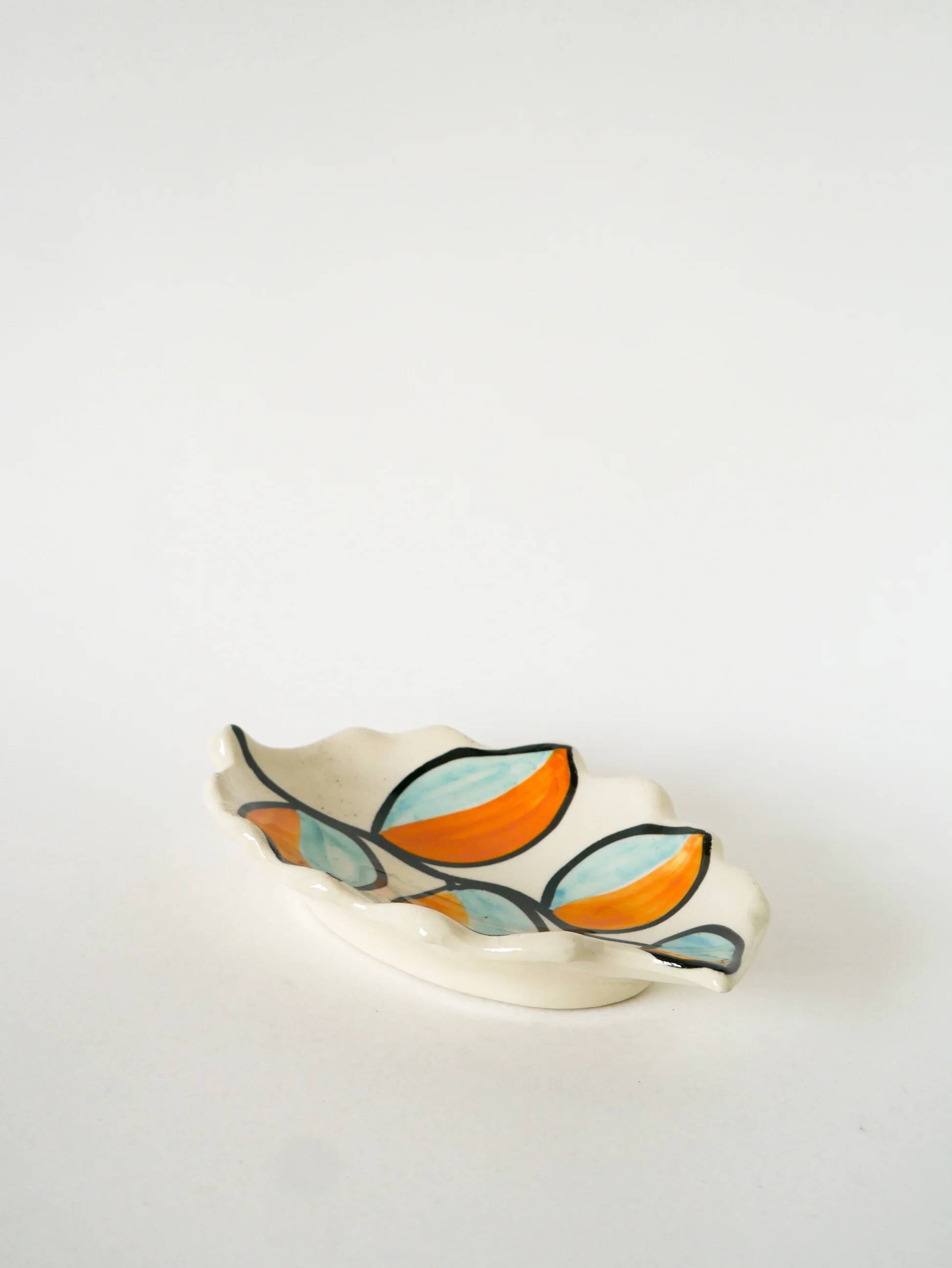Ceramic catchall, leaf shape, orange and blue, psychedelic, 1970.