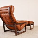 Vintage leather armchair with hocker, 1970s