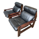 Vintage Scandinavian armchairs in leather and solid wood.