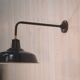 Antique cast iron wall bracket and enamelled globe, 1950s