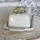 Large vintage earthenware and slip butter dish with fruit motif