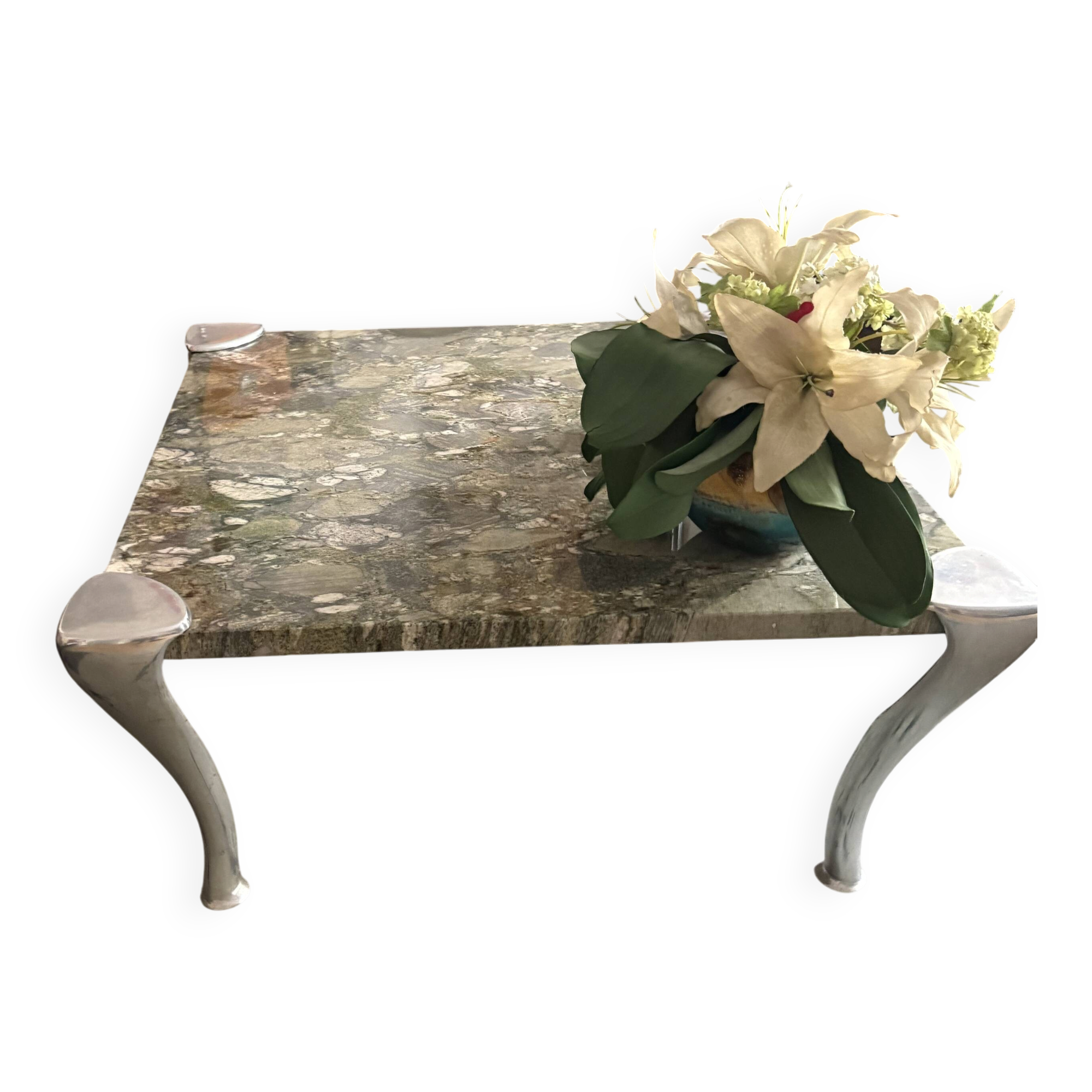 Contemporary coffee table with a marble top and steel base.