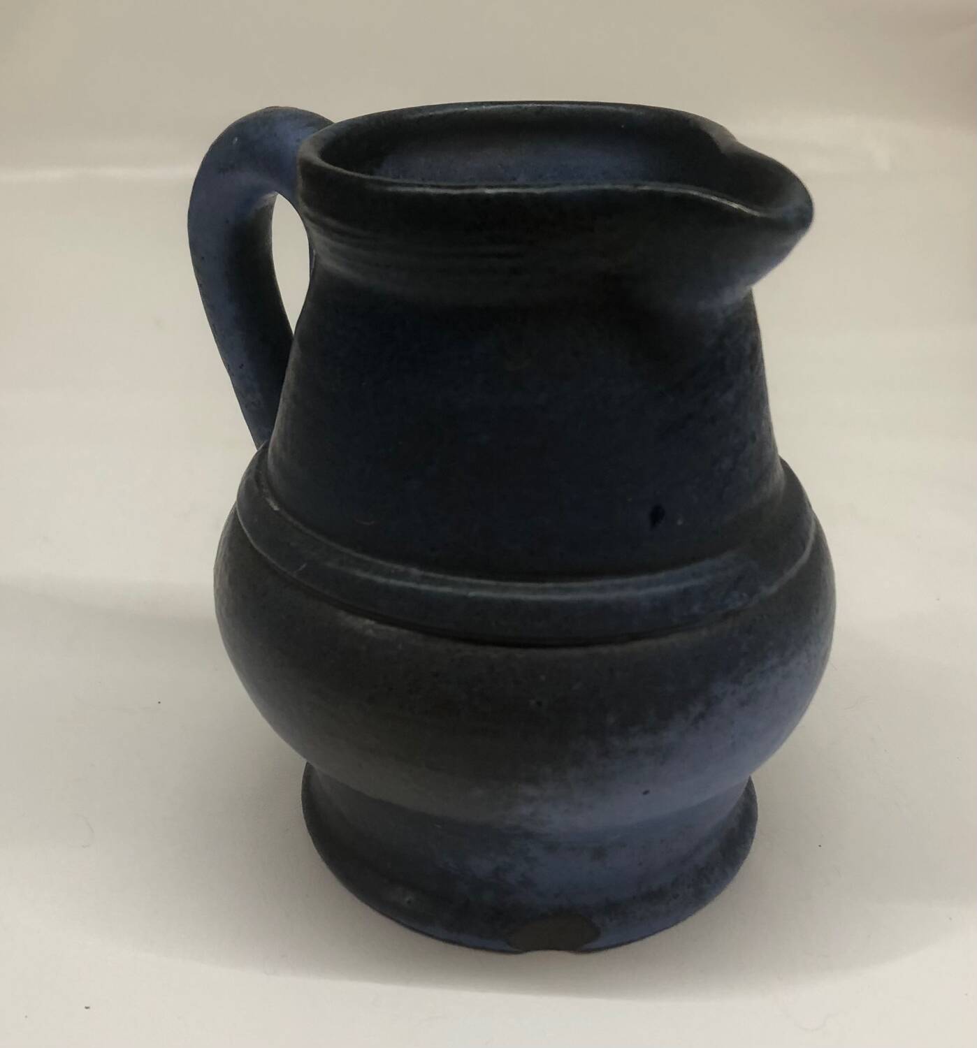 Ceramic pitcher by Roland Tostivint