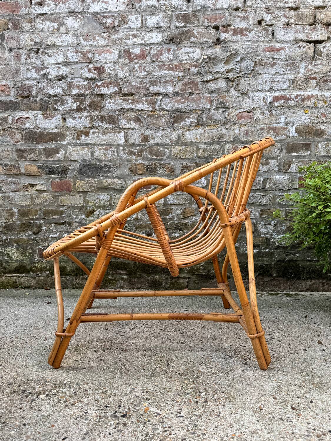 Vintage rattan shell armchair