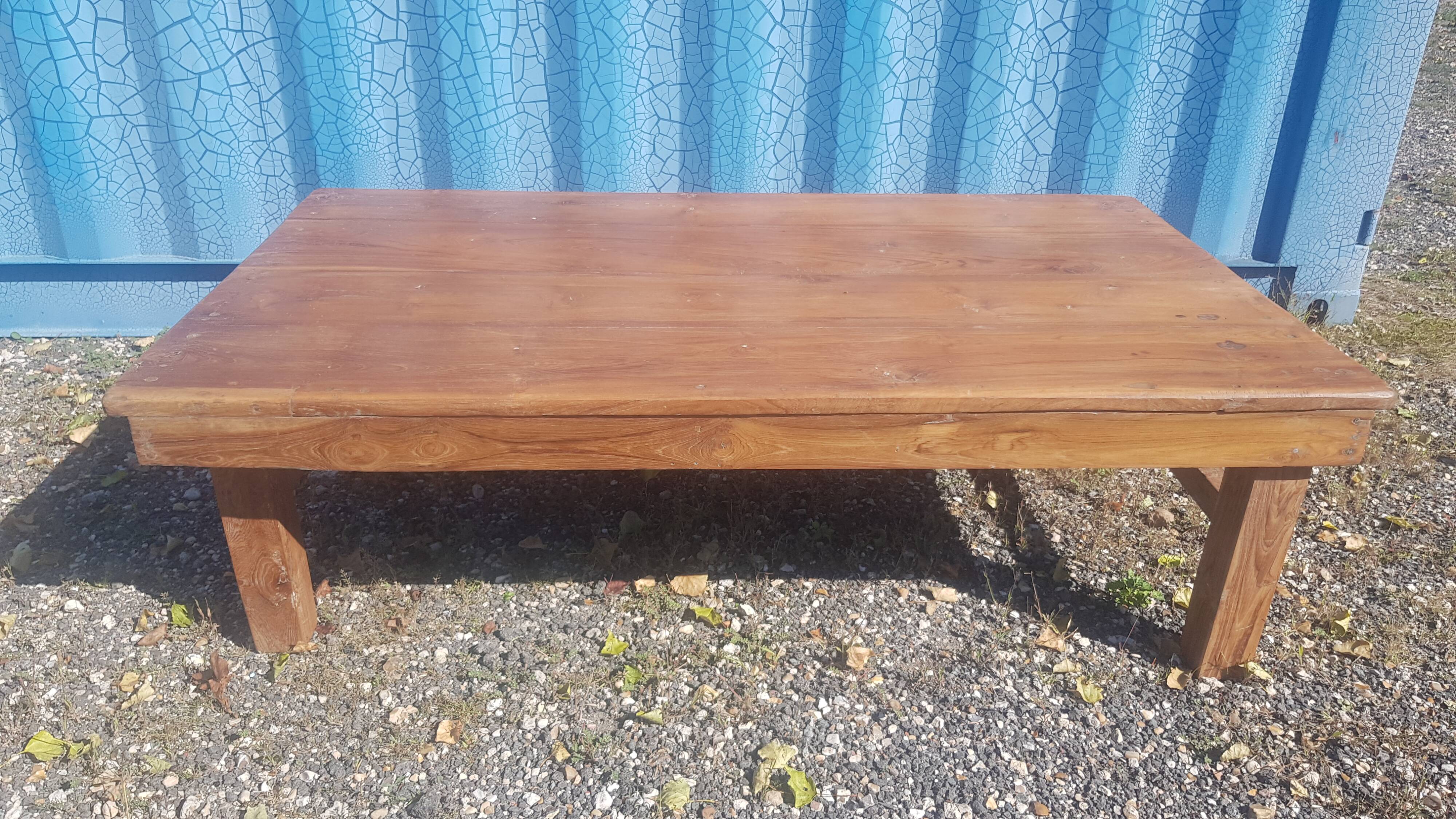 Old industrial workshop coffee table made of solid teak.
