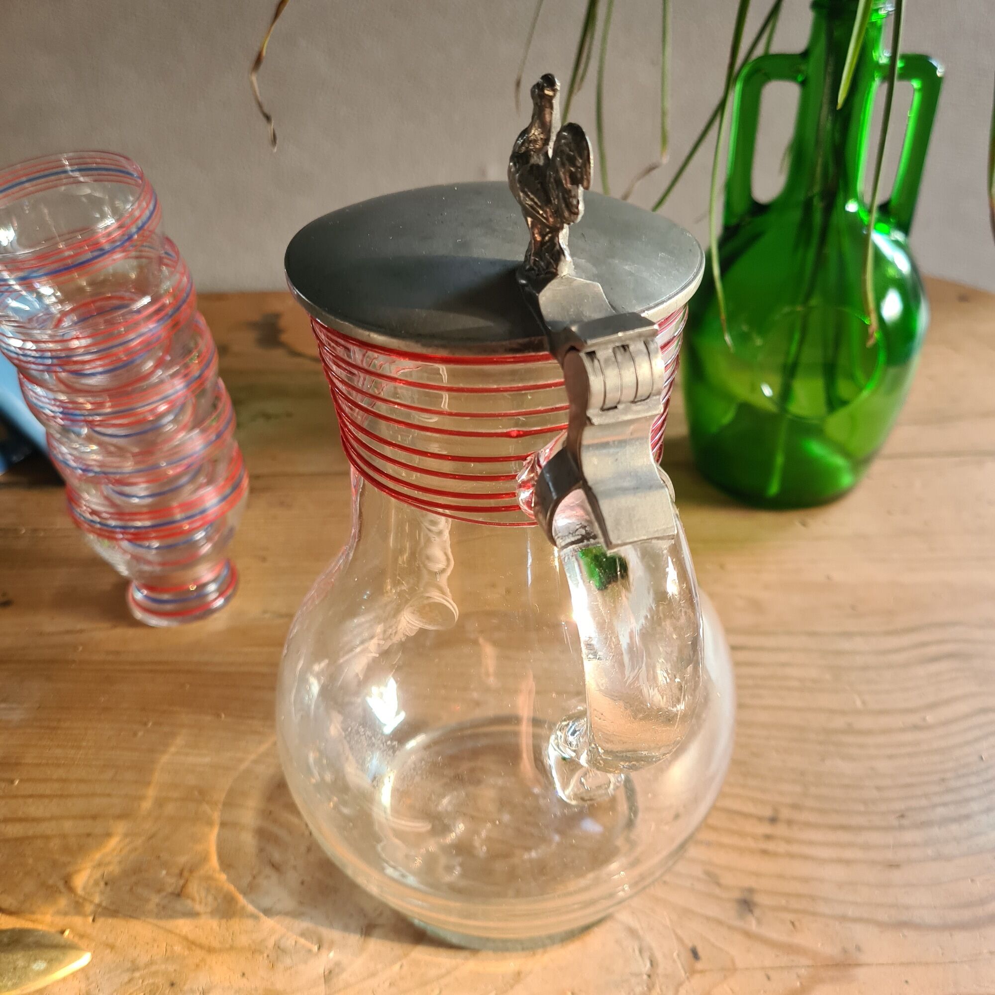 Blowing glass decanter with tin lid decorated with a rooster