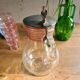 Blowing glass decanter with tin lid decorated with a rooster
