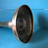 Large candlestick in chiseled brass