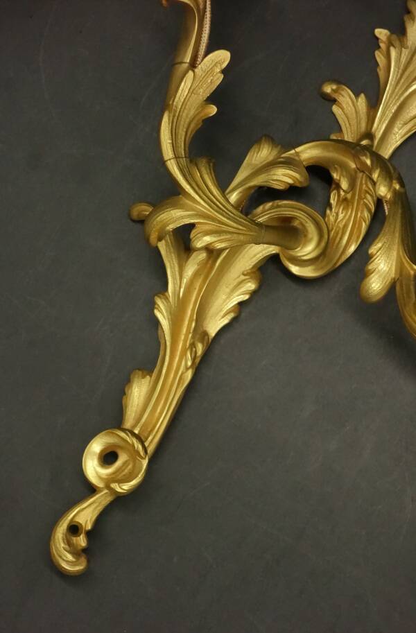 Large pair of stamped wall sconces in Louis XV style - gilded bronze