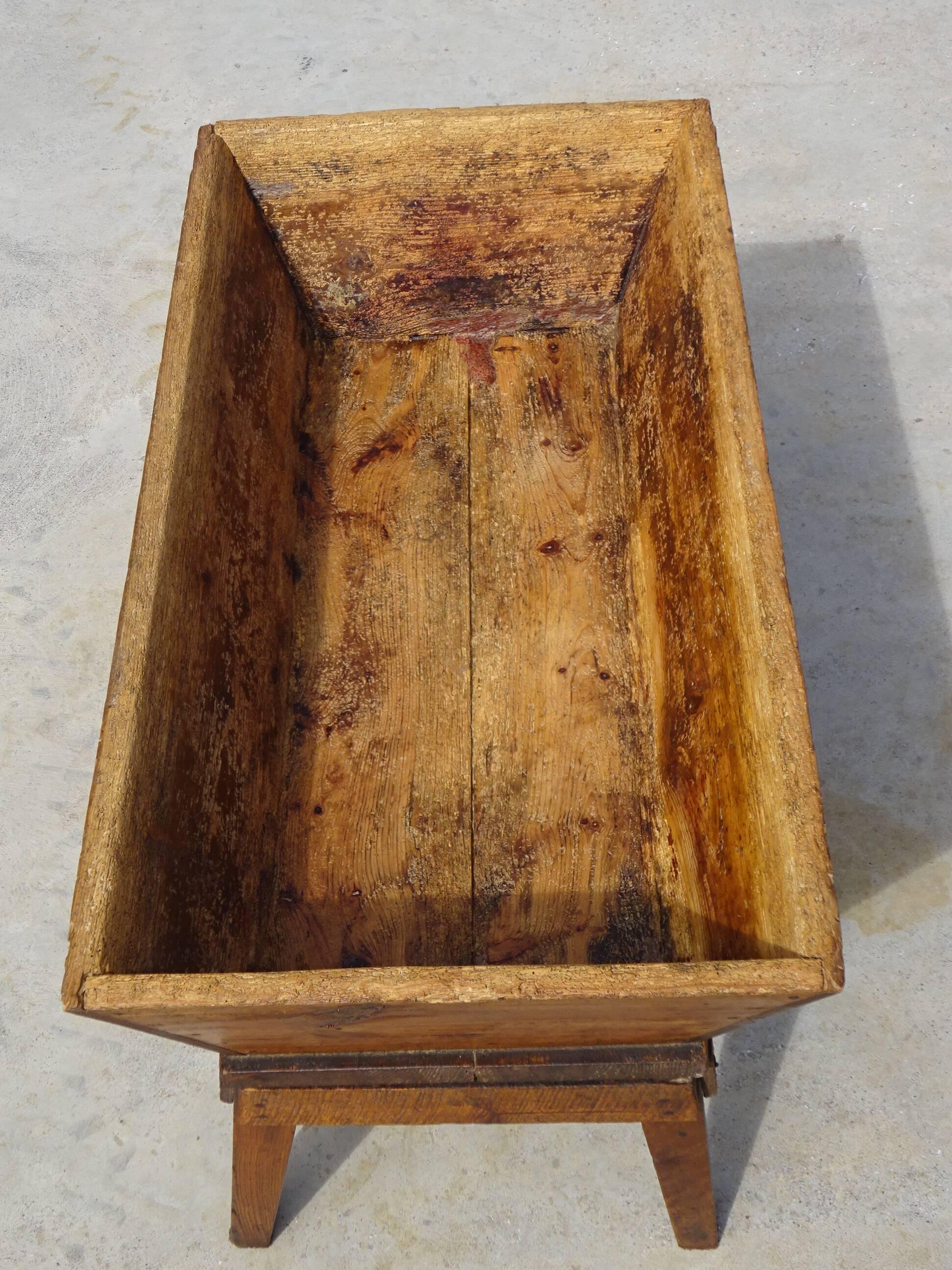 Very old solid oak dough trough with a lid and removable legs.