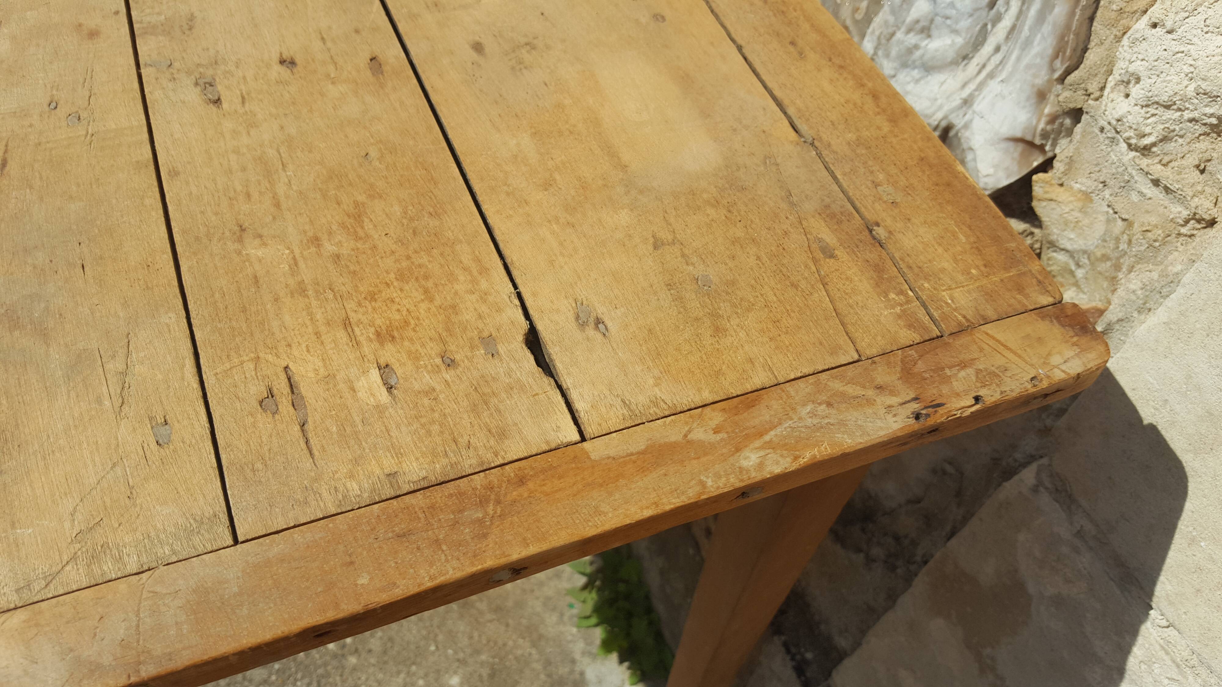 Raw wood farm table with drawer