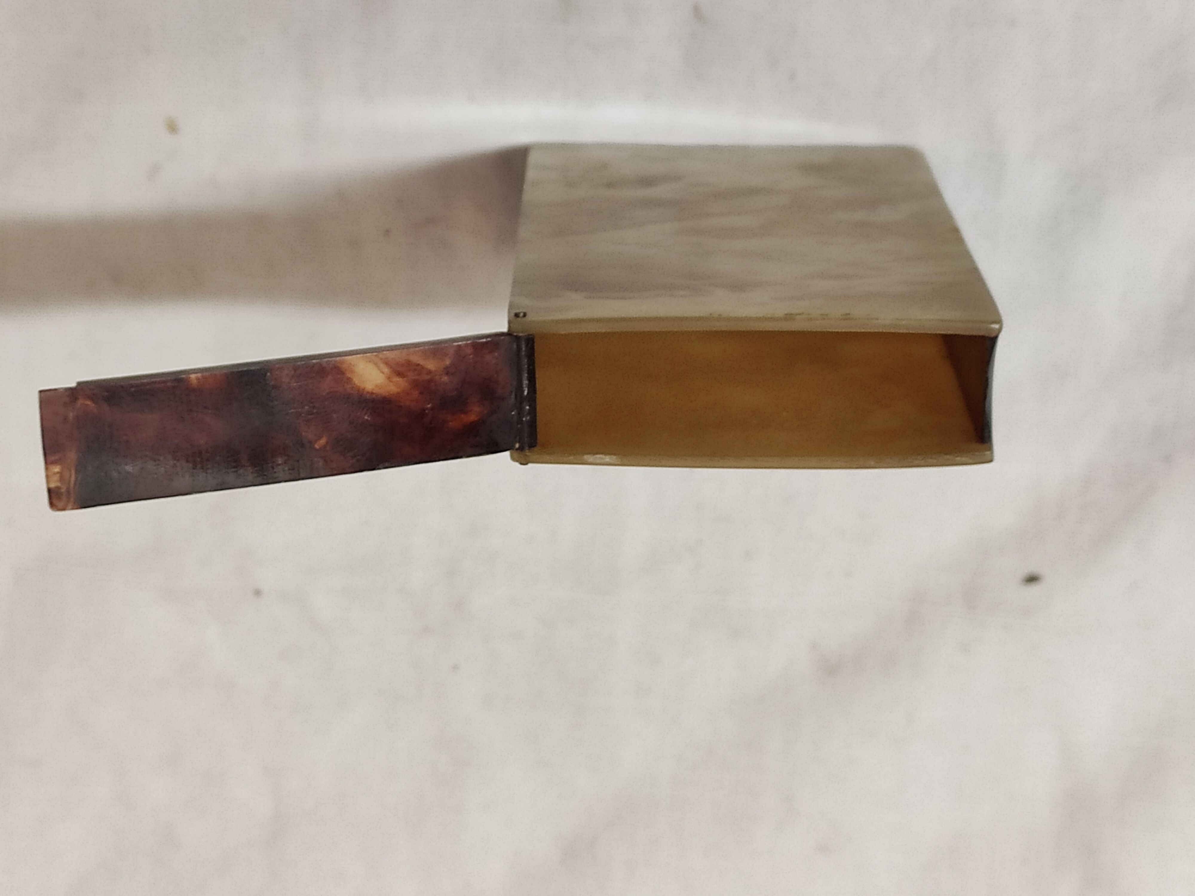 Cigarette case, 1930, tortoise scale & mother-of-pearl