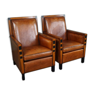 Ensemble de deux fauteuils art déco en cuir