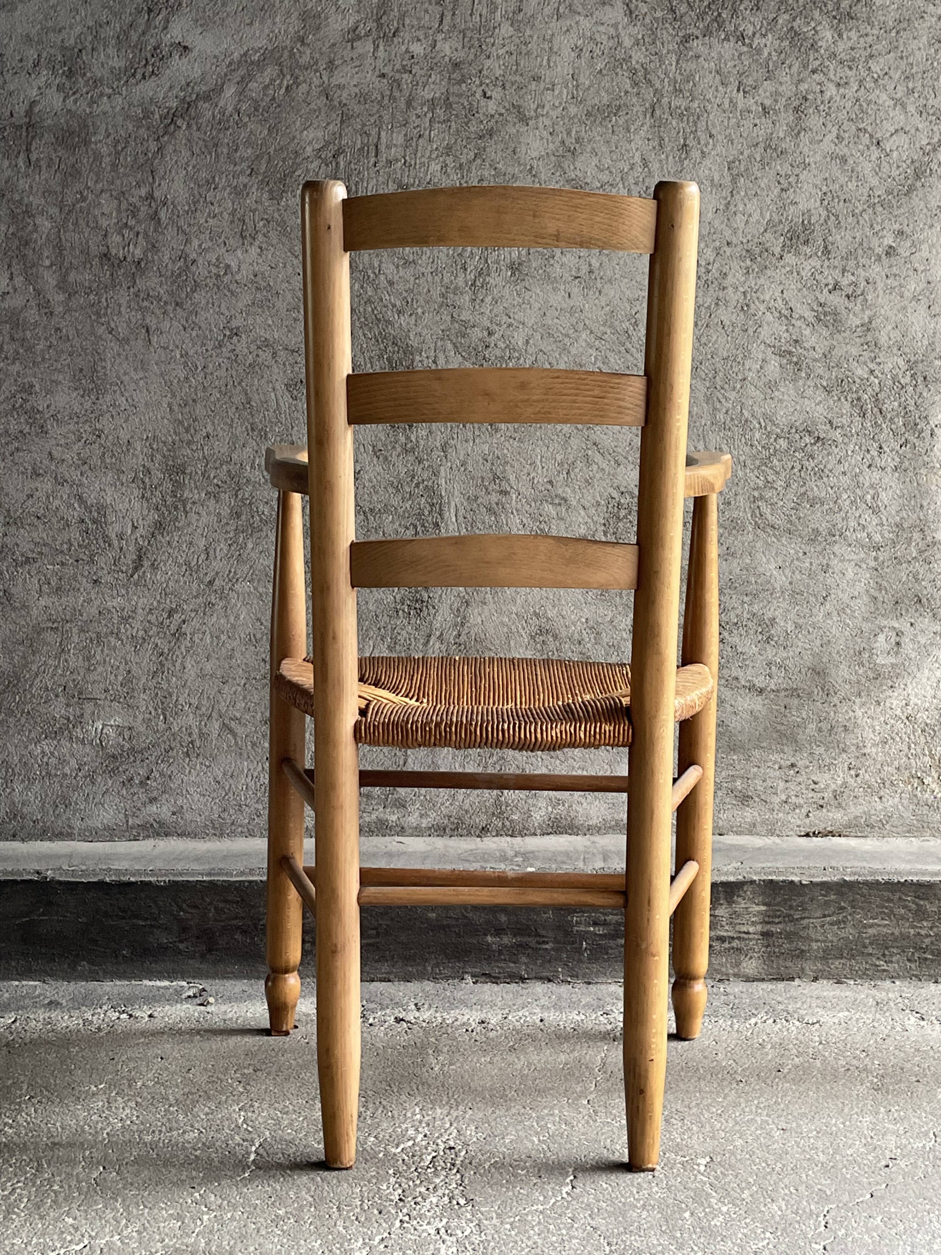 Straw chair with armrests, France