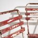 Antique red and white patio chairs (circa 1920). Set of 4 pieces