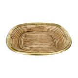 Empty rattan and brass pocket