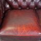 Original English Chesterfield sofa in red cowhide 2 seater
