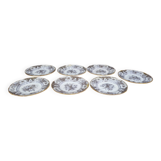 Set of 6 plates plus 1 in English porcelain, early 20th century