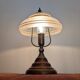 Vintage lamp made of turned wood, brass, and frosted glass.