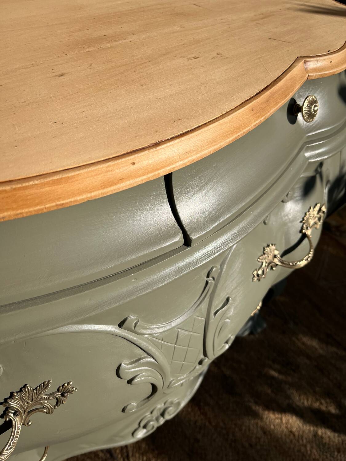Renovated curved tomb chest of drawers in clay green and wood