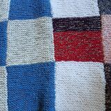 Hand knitted patchwork plaid