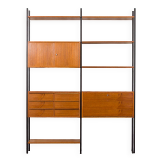 Tall Italian bookcase, or a room divider in teak with hidden desk or a bar cabinet, 1970