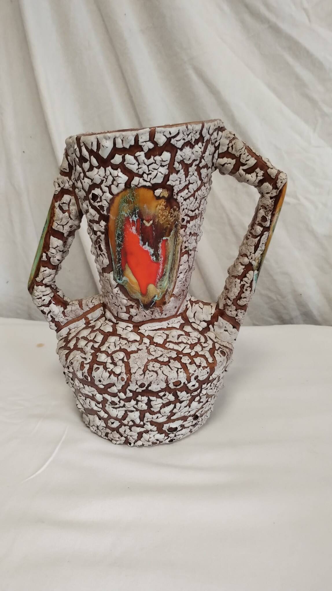Cracked ceramic vase from the 70s