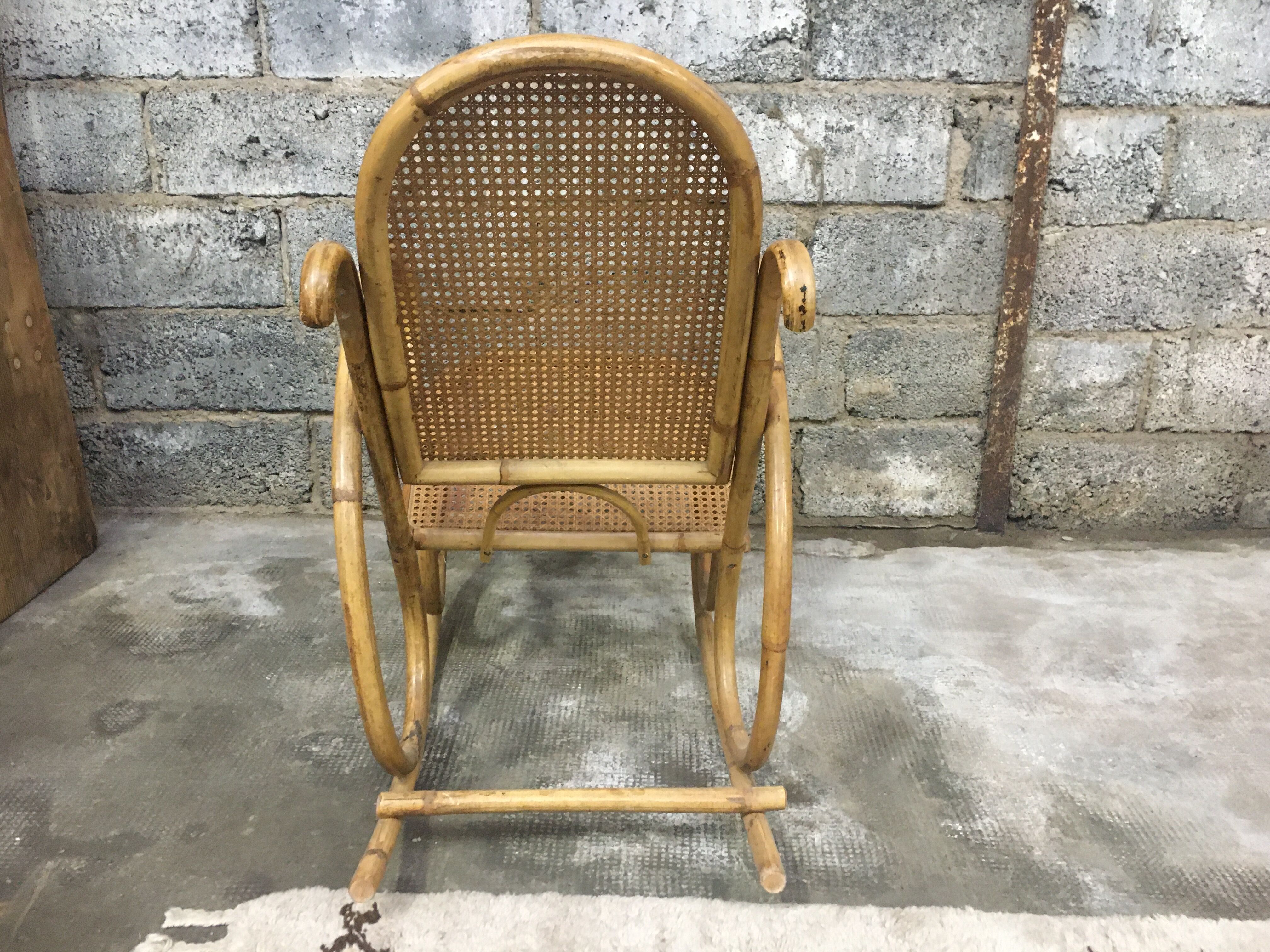 Rocking-chair in bamboo rattan and vintage wicker 1950